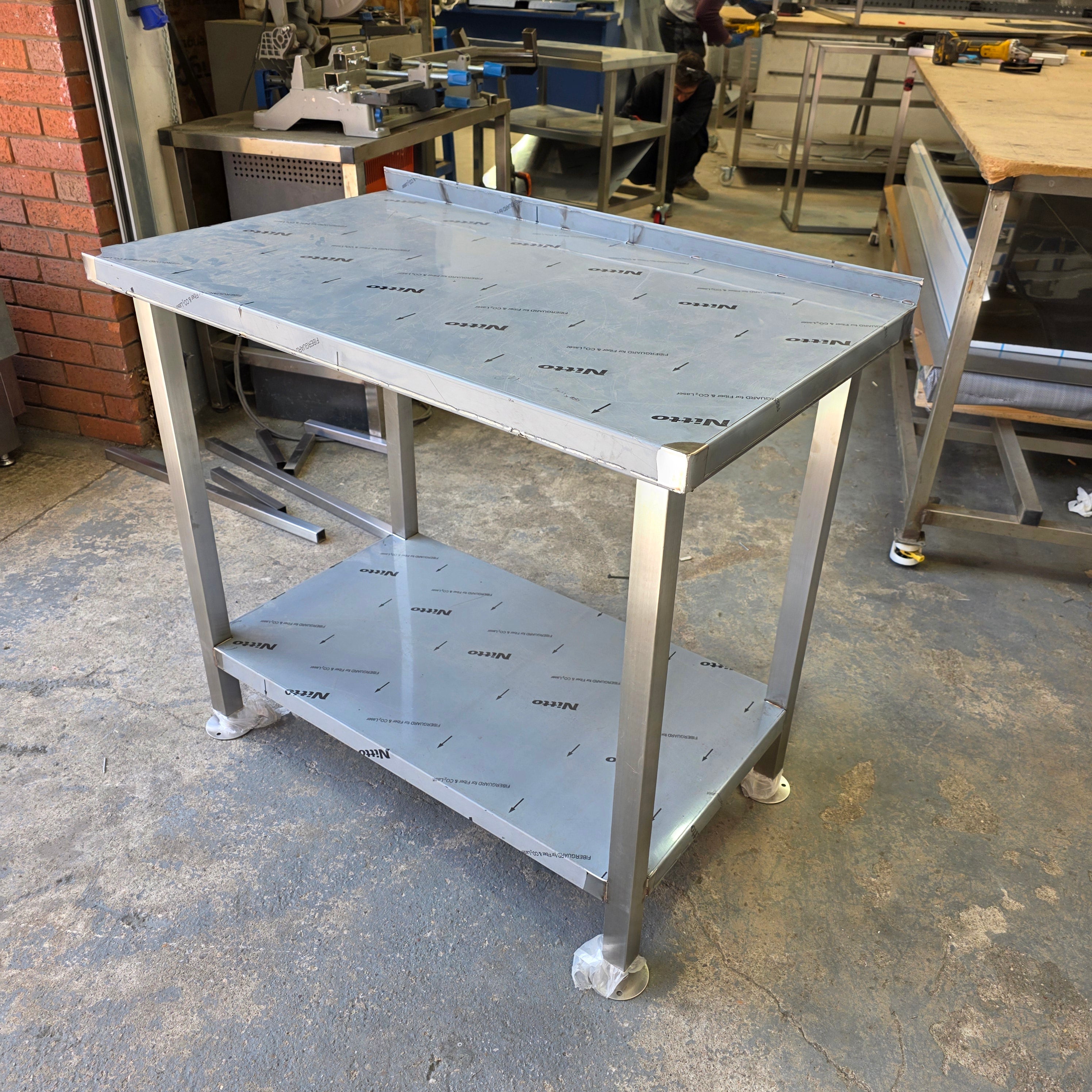 Stainless steel tables